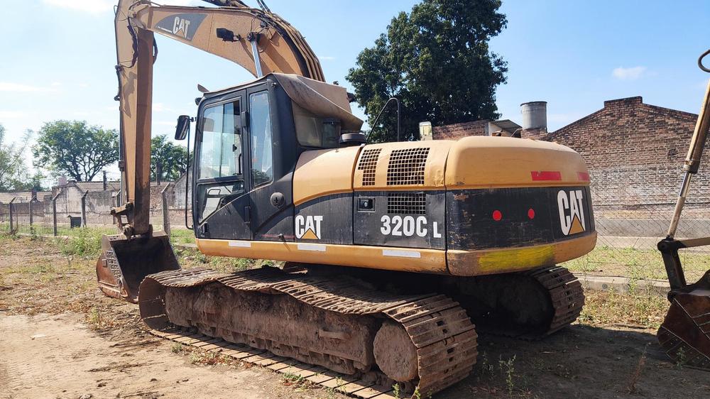 MONASTERIO TATTERSALL - Retroexcavadora CAT 320CL